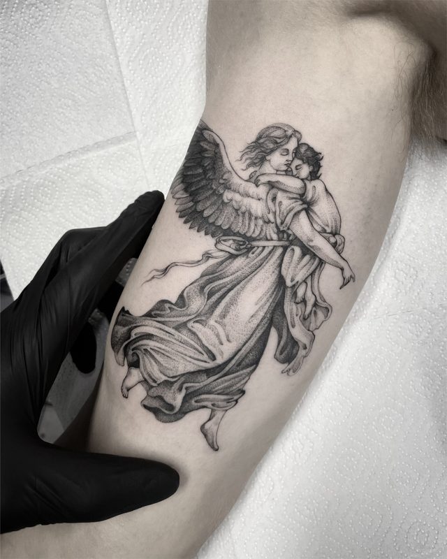 Fine line angel carrying a child tattoo