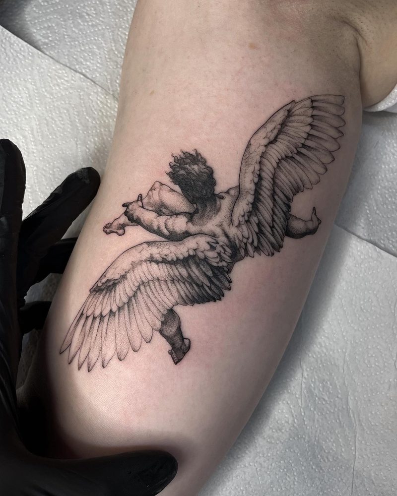 Fine line angel wings arm tattoo