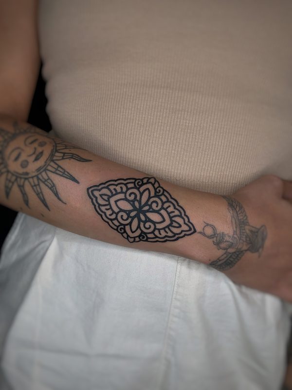 Ornamental forearm mandala piece