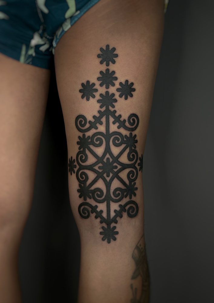 Ornamental mandala-style tattoo pattern