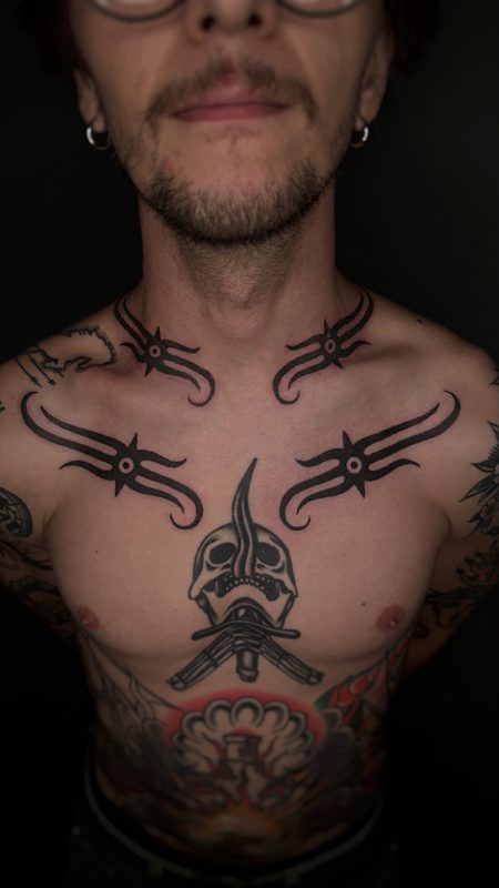 Tribal blackwork chest piece